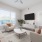 Cozy apartment living room with large window