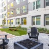 Fireplace and Adirondack chairs for residents